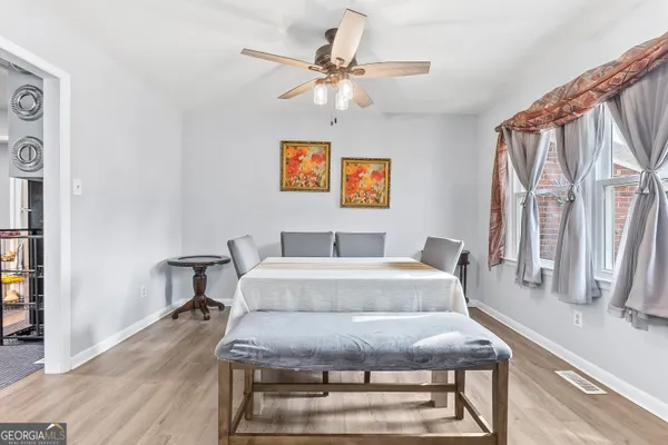 a living room with furniture and a table