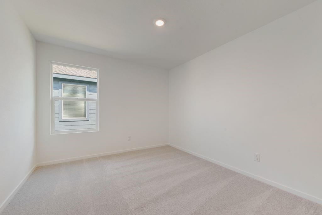 245 Boxberry Way Princeton, TX 75407 - Photo 17 of 23 an empty room with a window