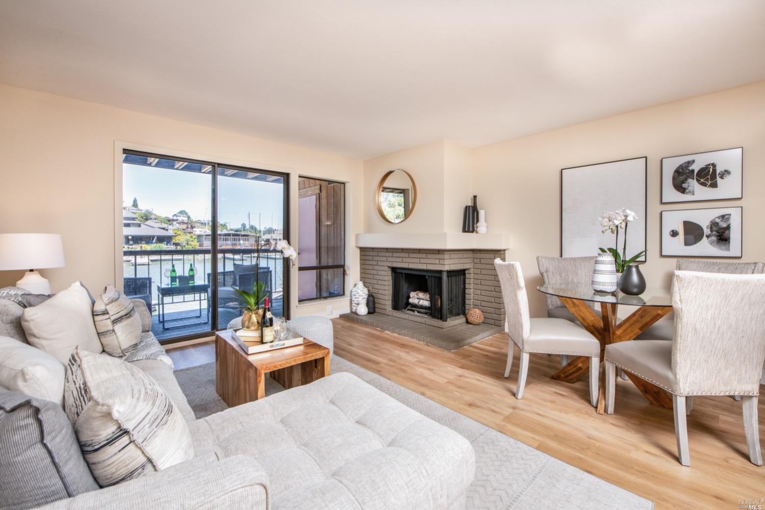 490 Canal Street, Unit 2 San Rafael, CA 94901 - Photo 1 of 1 a living room with furniture and a fireplace