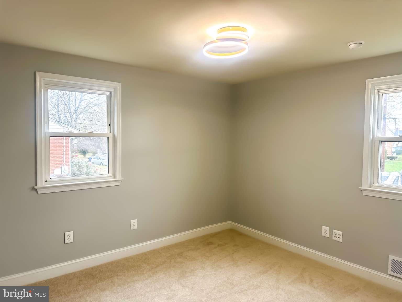 7107 Loch Raven Road Temple Hills, MD 20748 - Photo 14 of 36 an empty room with a window