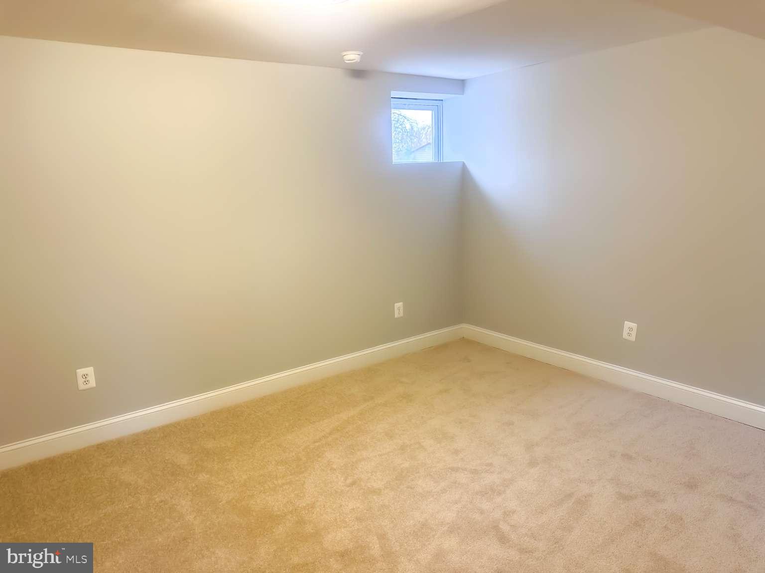 7107 Loch Raven Road Temple Hills, MD 20748 - Photo 25 of 36 an empty room with windows