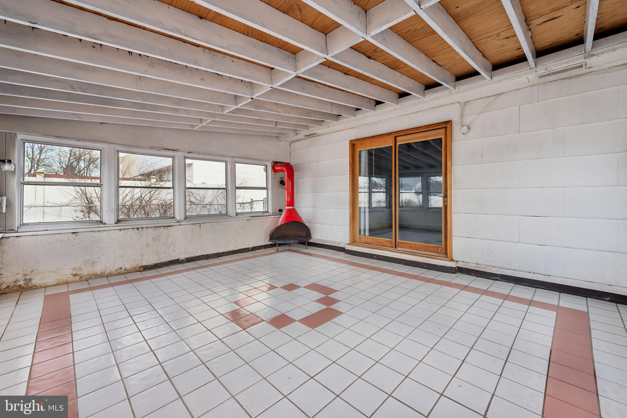 116 Colonial Road Beverly, NJ 08010 - Photo 15 of 25 a view of an empty room with a window