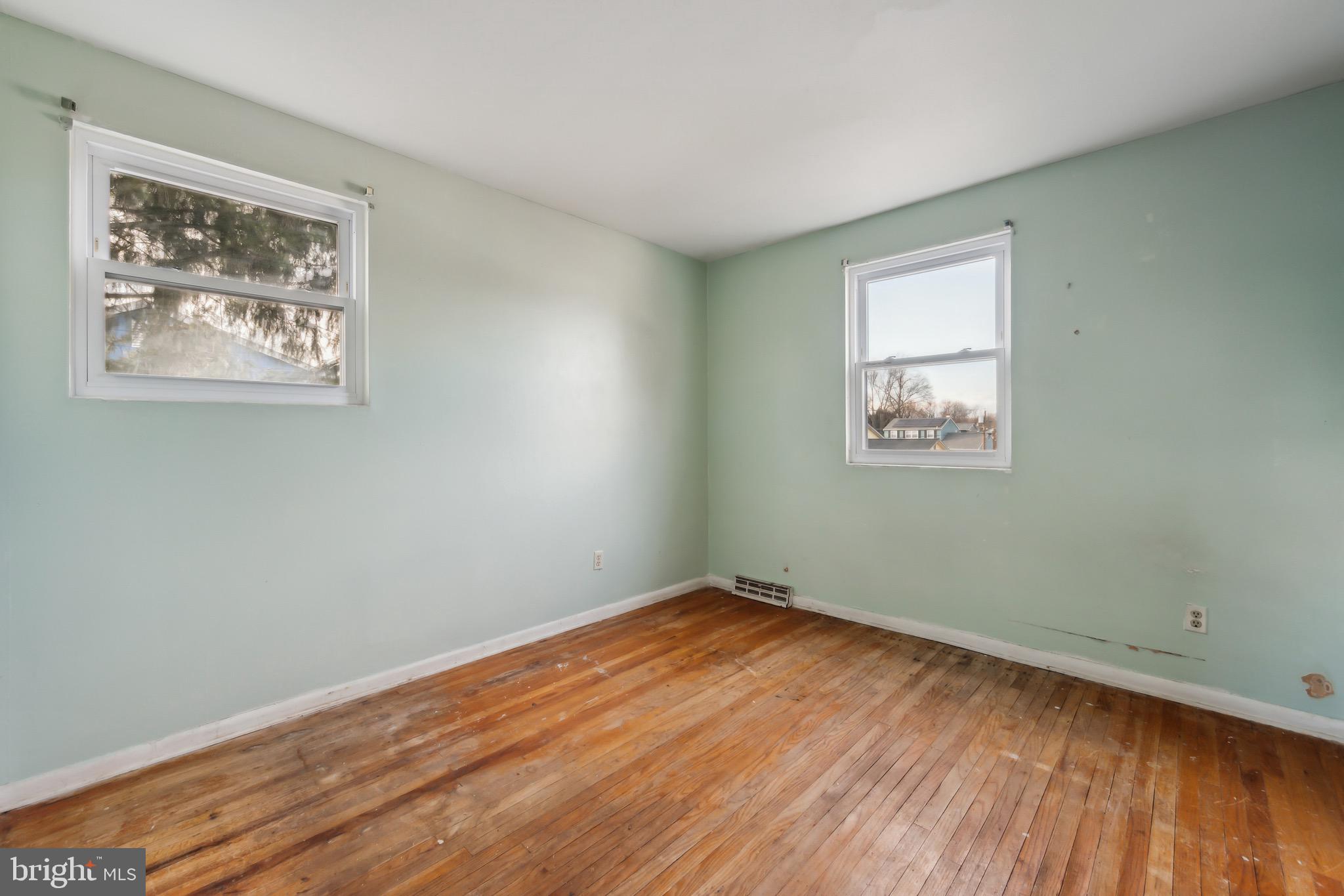 116 Colonial Road Beverly, NJ 08010 - Photo 20 of 25 a view of empty room with wooden floor