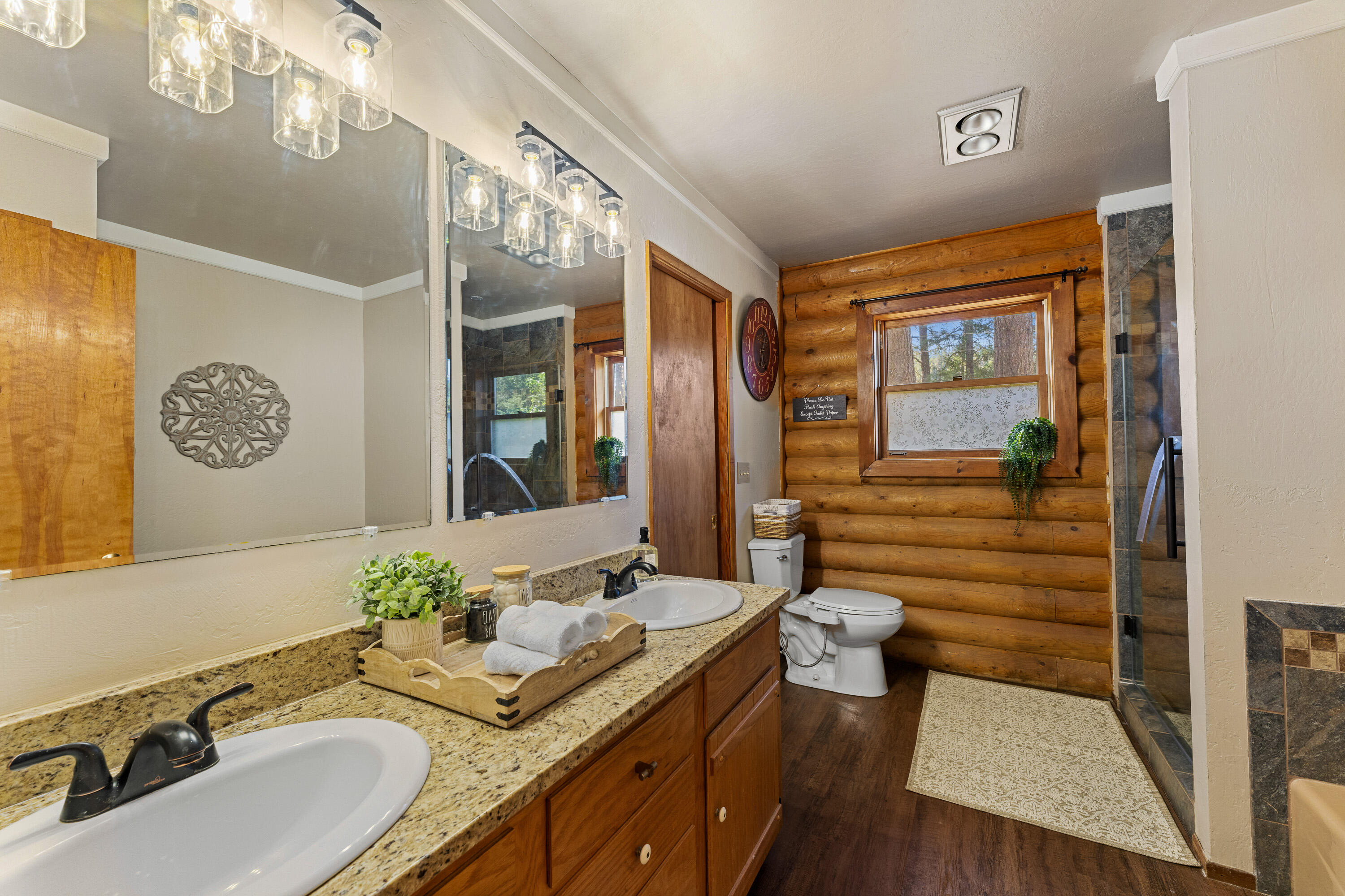 1201 Reeves Creek Road Selma, OR 97538 - Photo 15 of 38 a bathroom with a sink double vanity and a mirror