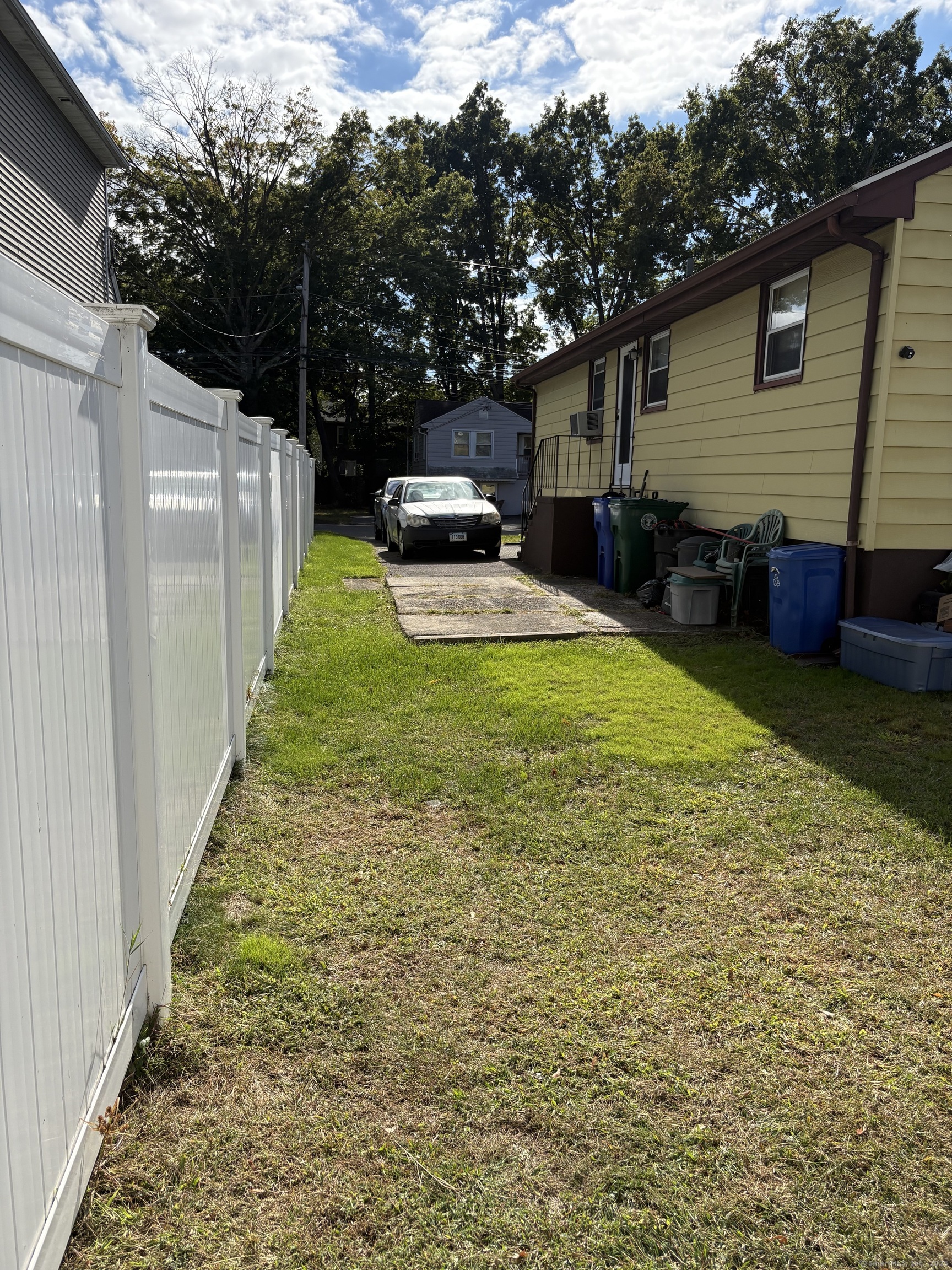 394 Harding Avenue Stratford, CT 06615 - Photo 4 of 11 a view of a backyard with sitting area