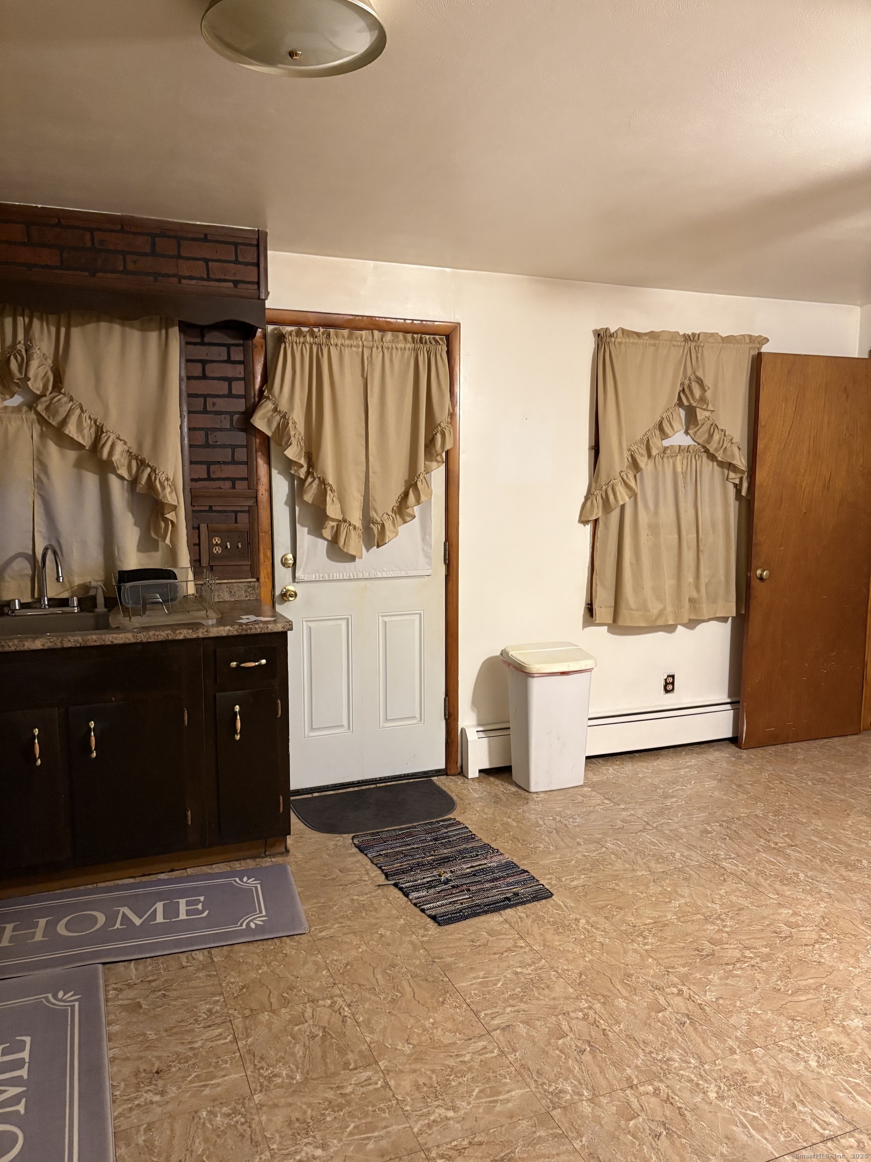 394 Harding Avenue Stratford, CT 06615 - Photo 7 of 11 a view of room with window and cabinet