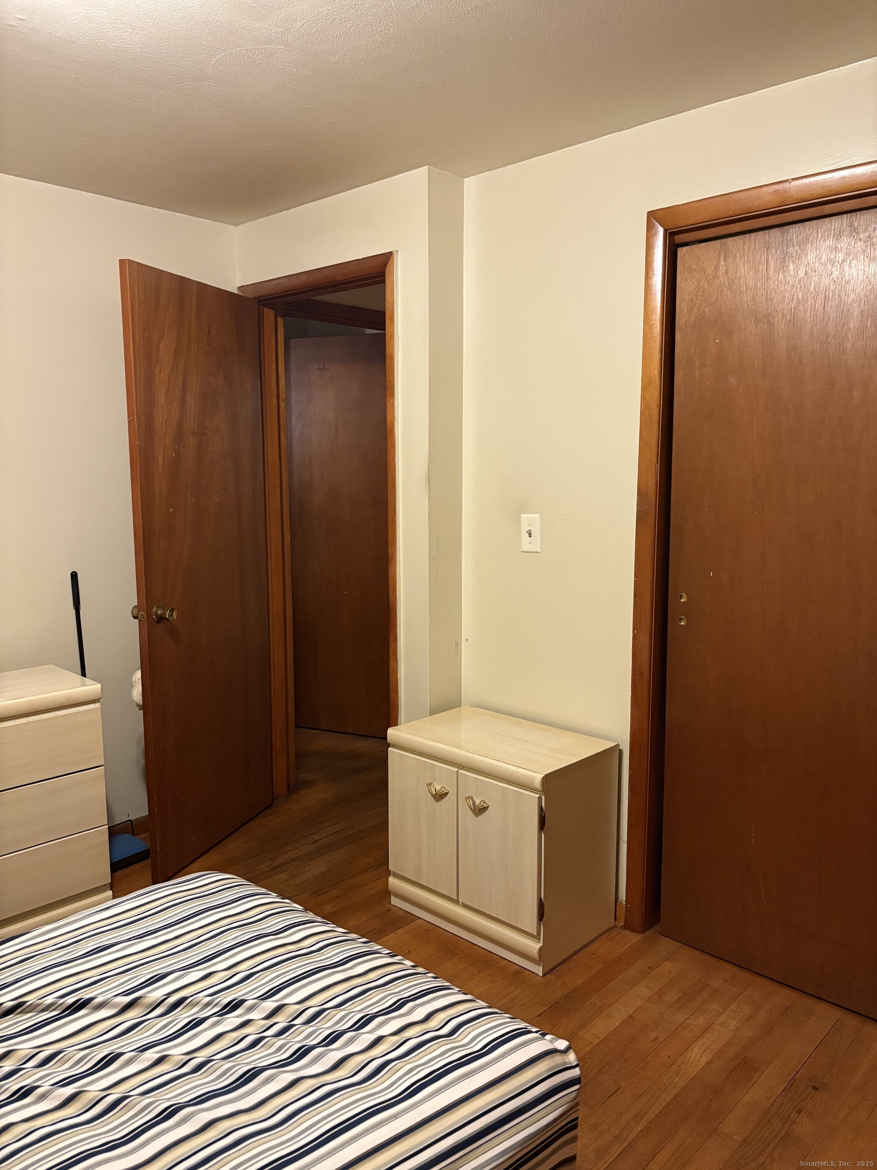 394 Harding Avenue Stratford, CT 06615 - Photo 10 of 11 a bedroom with a bed and a shower