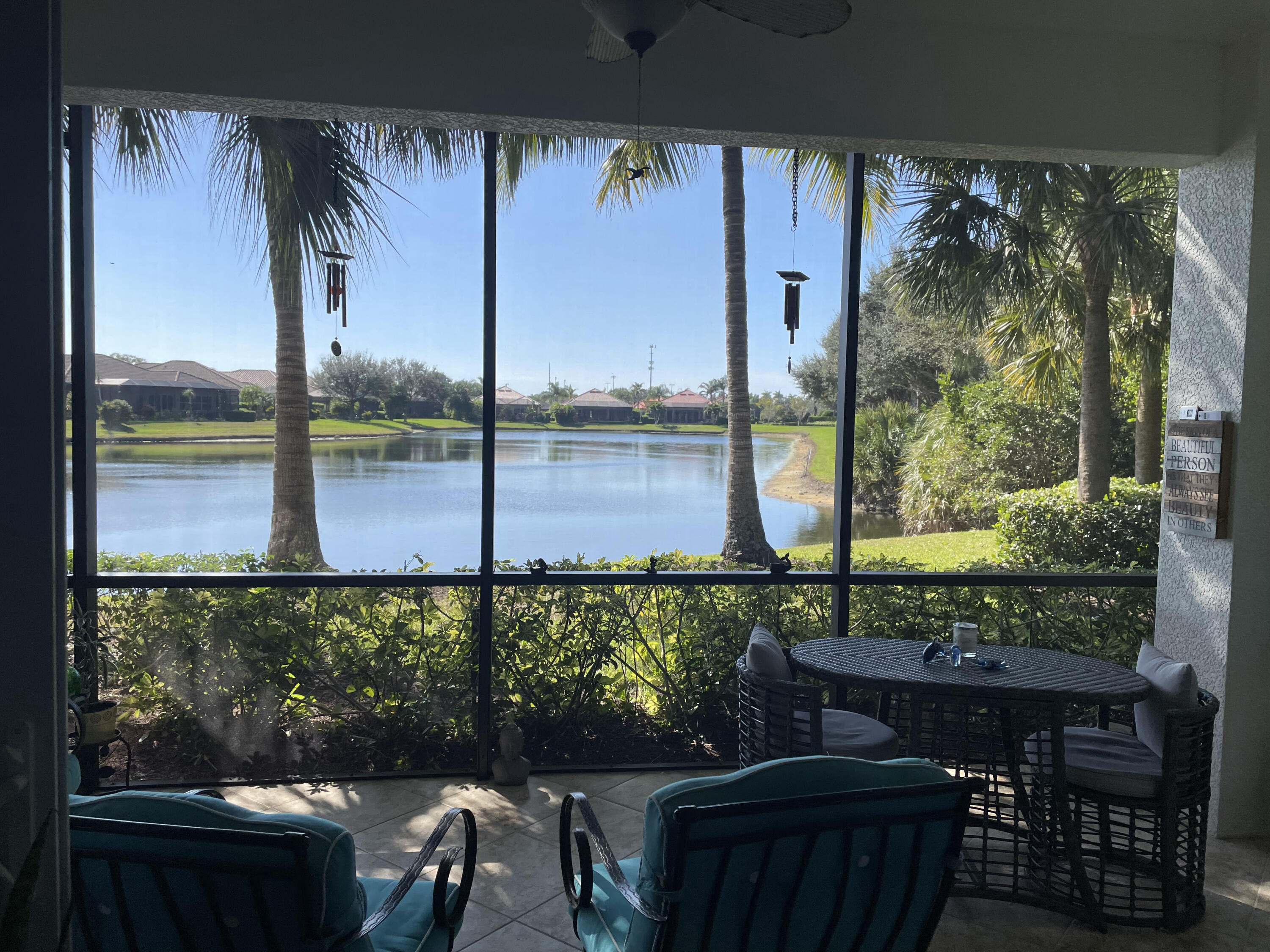 6410 Legacy Circle, Unit 1002 Naples, FL 34113 - Photo 1 of 1 a view of a chairs and table in the balcony