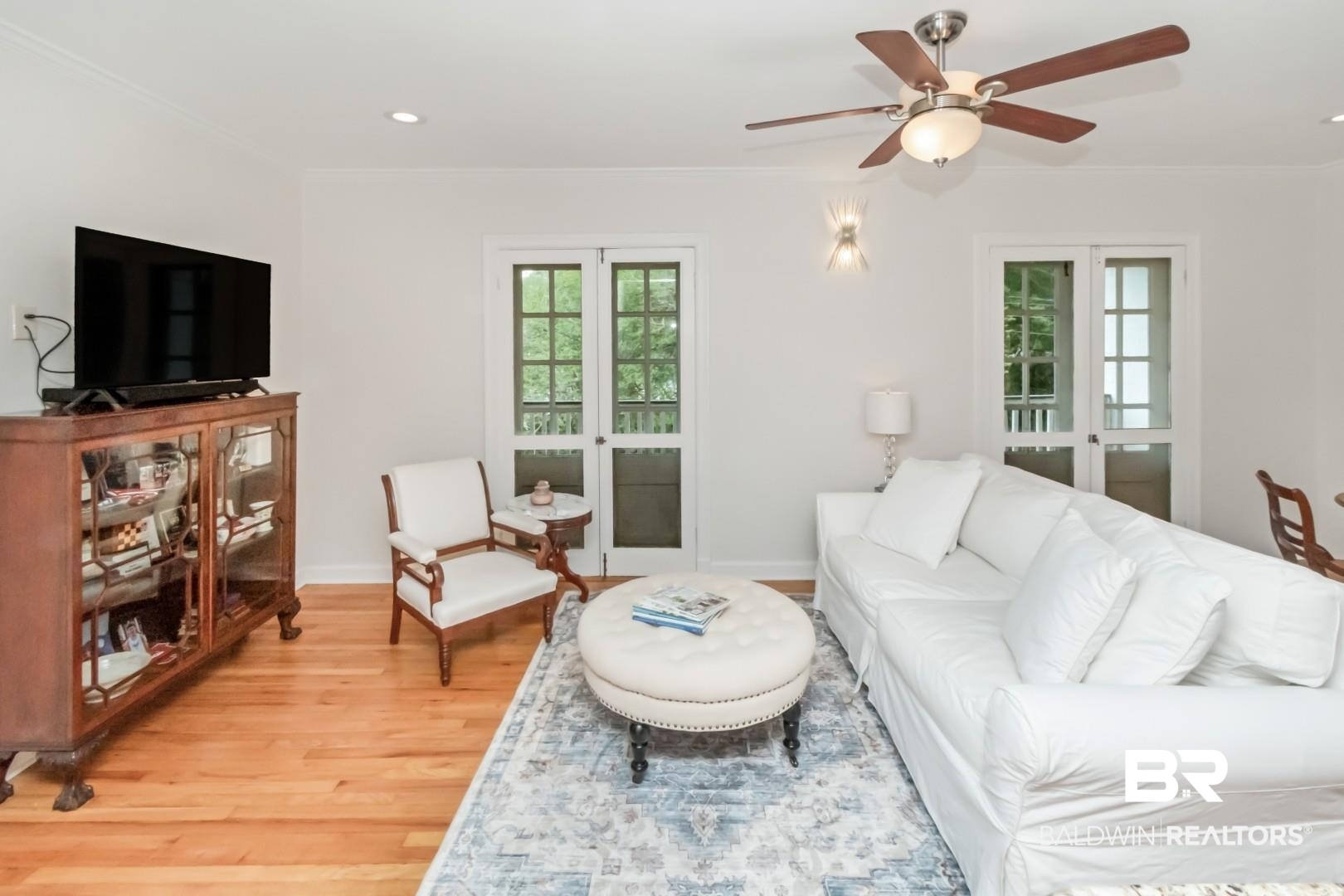 214 Upham Street, Unit 3D Mobile, AL 36607 - Photo 6 of 34 Living area featuring french doors, light wood finished floors, a ceiling fan, crown molding, and recessed lighting