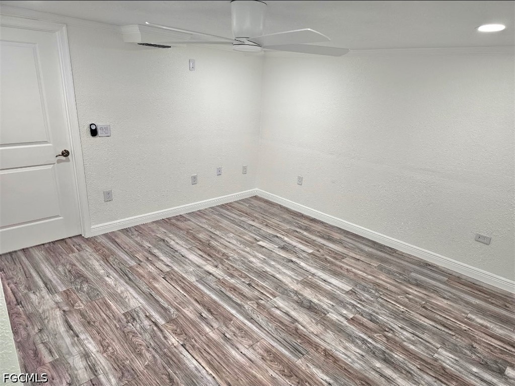 1130 Patterson Road Cape Coral, FL 33909 - Photo 7 of 21 a view of a room with wooden floor