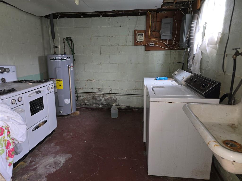 908 Walnut Street Bolivar, PA 15923 - Photo 22 of 25 a utility room with dryer and washer