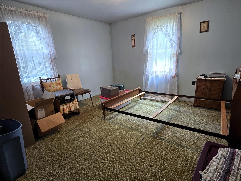 908 Walnut Street Bolivar, PA 15923 - Photo 10 of 25 a living room with furniture rug and window