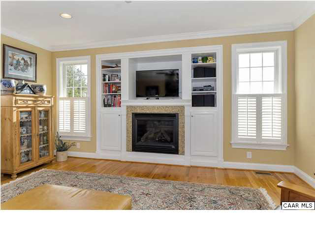 21 Ridgeview Drive Ruckersville, VA 22968 - Photo 16 of 41 a living room with a flat screen tv and a fireplace