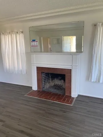 a living room with a fireplace