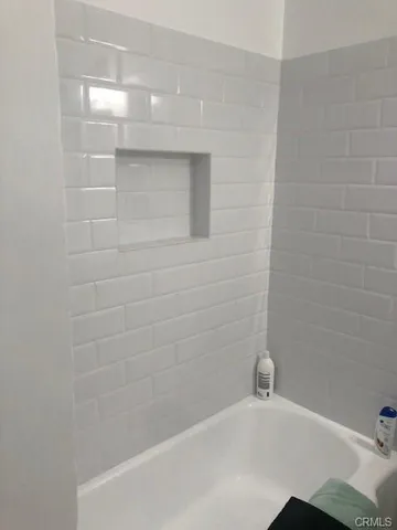 a bathroom with a bathtub