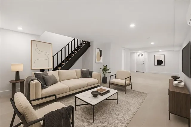 a view of an empty room with stairs