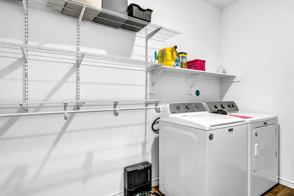 a utility room with dryer and washer