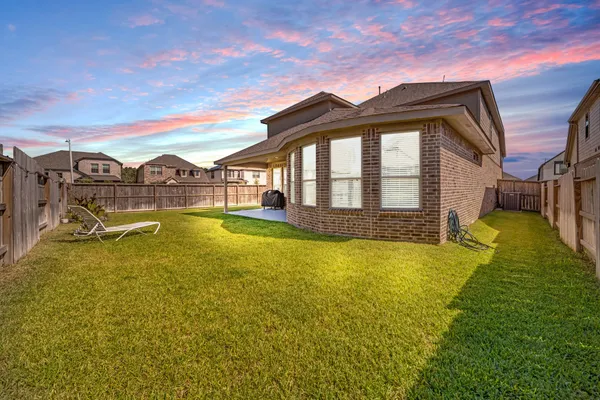 a view of a house with a swimming pool
