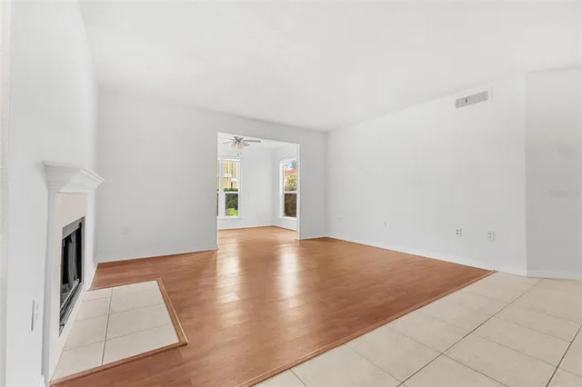 a view of livingroom with hardwood floor and a fireplace