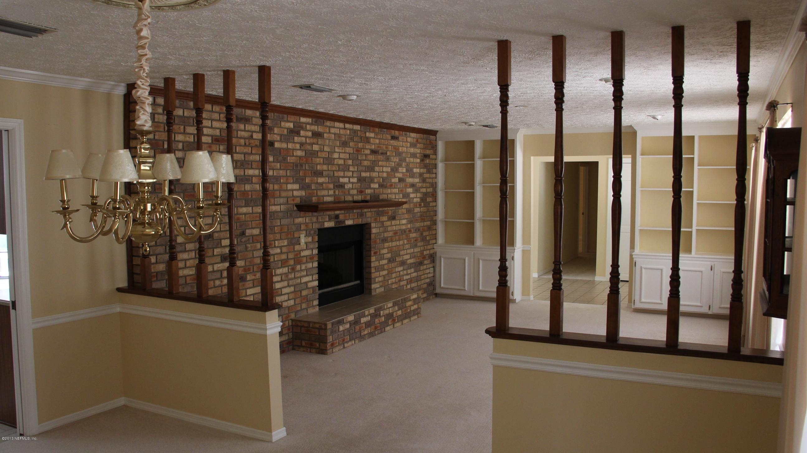 1386 Ree Street Starke, FL 32091 - Photo 15 of 36 Livingroom and Dining w/ fireplace