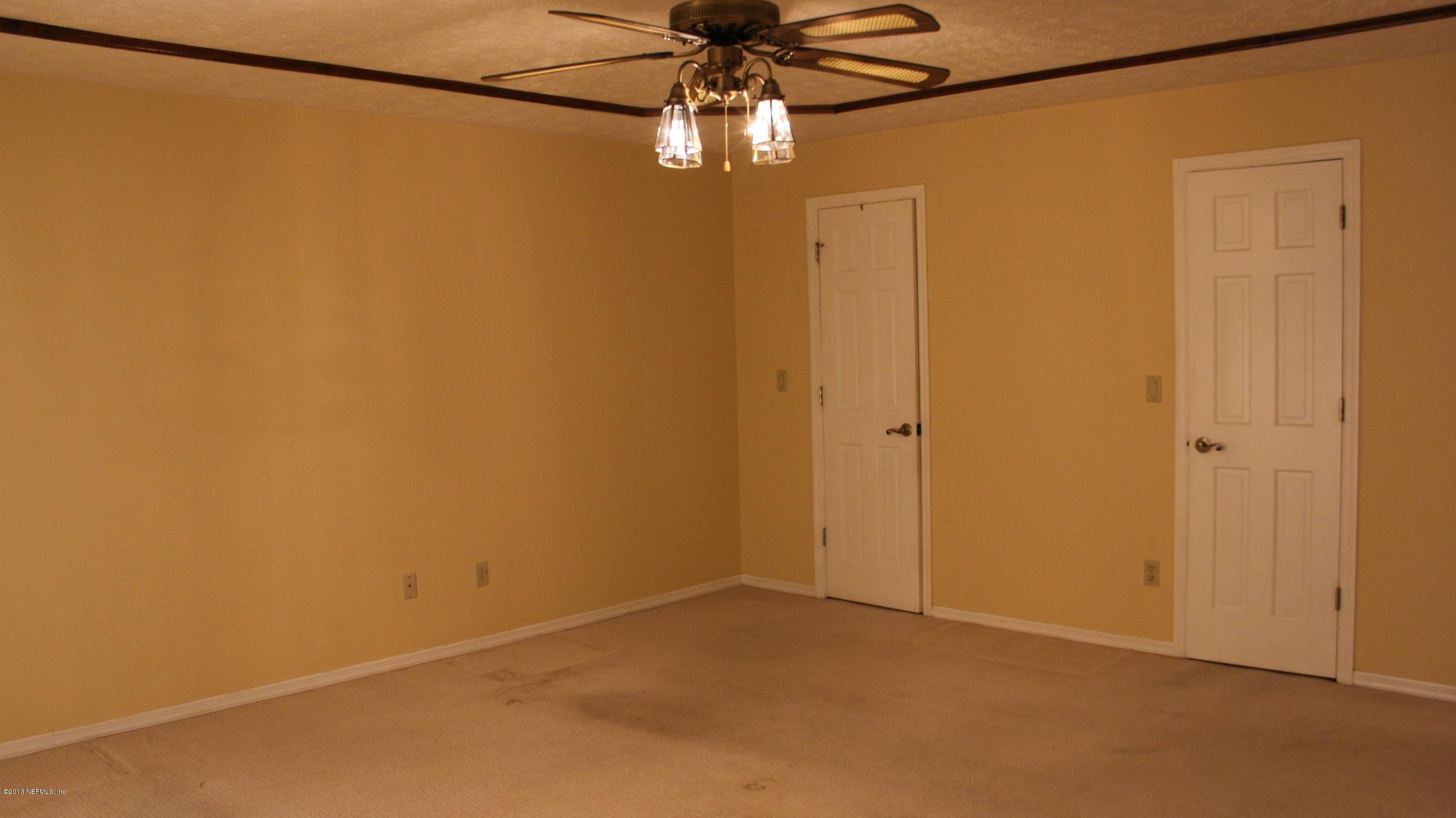 1386 Ree Street Starke, FL 32091 - Photo 30 of 36 Master Bedroom with walk in closet.