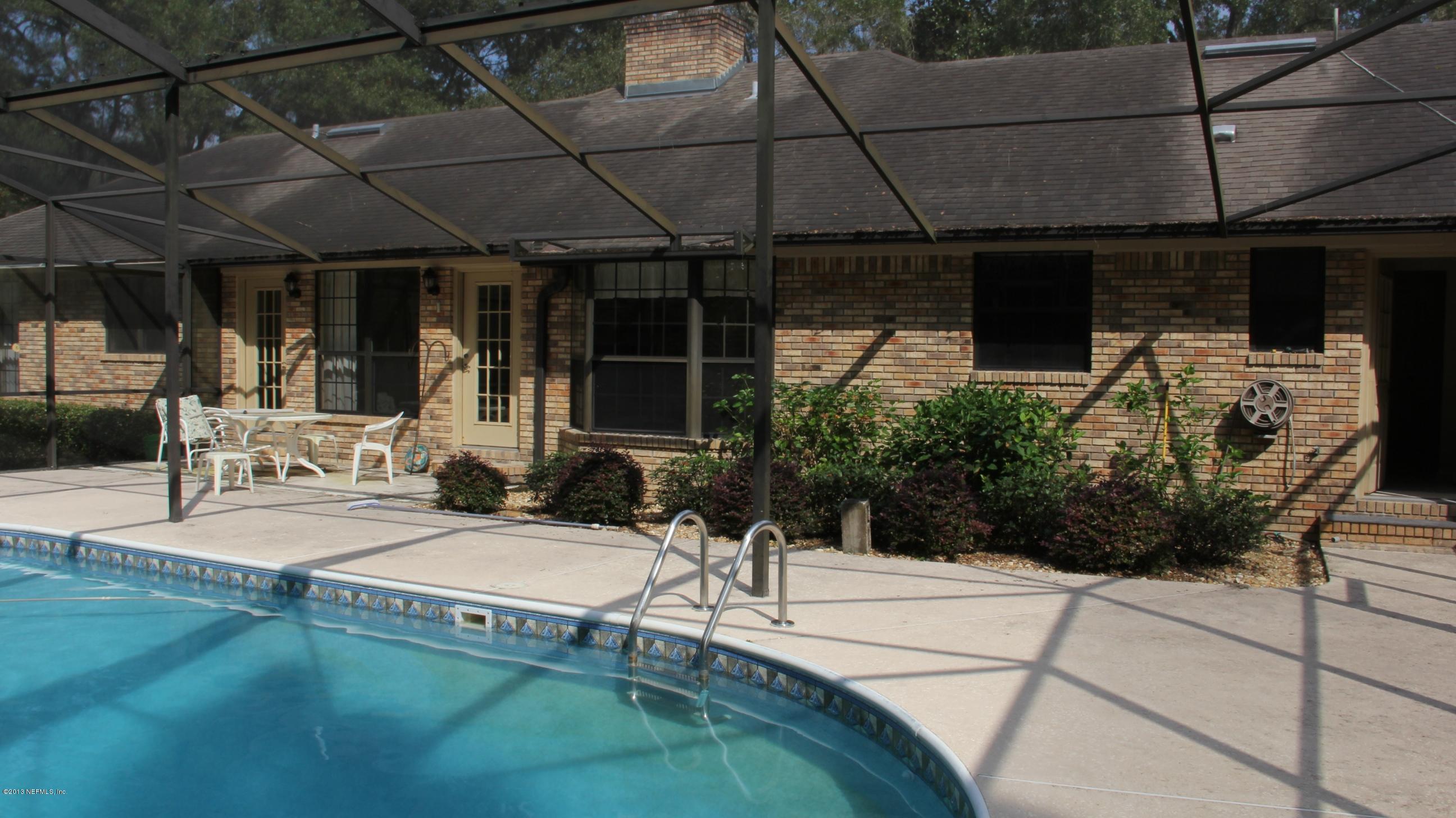 1386 Ree Street Starke, FL 32091 - Photo 36 of 36 Back view of home in pool area.