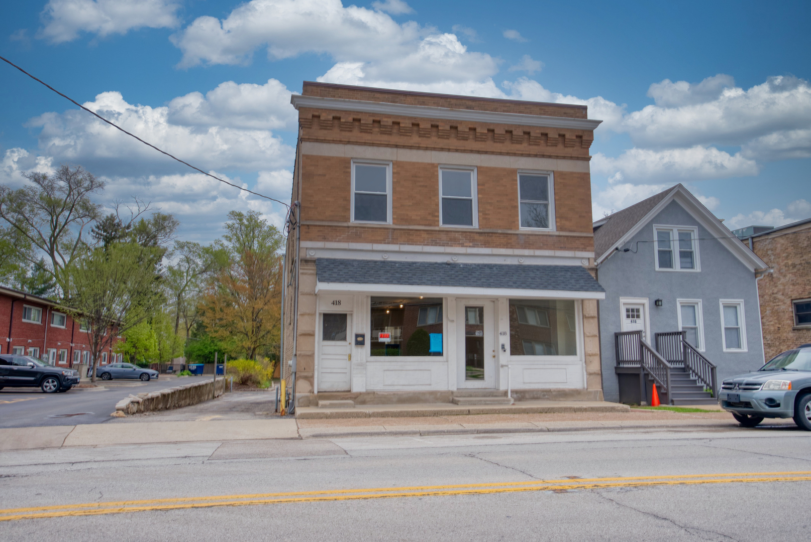 a view of a building with a street