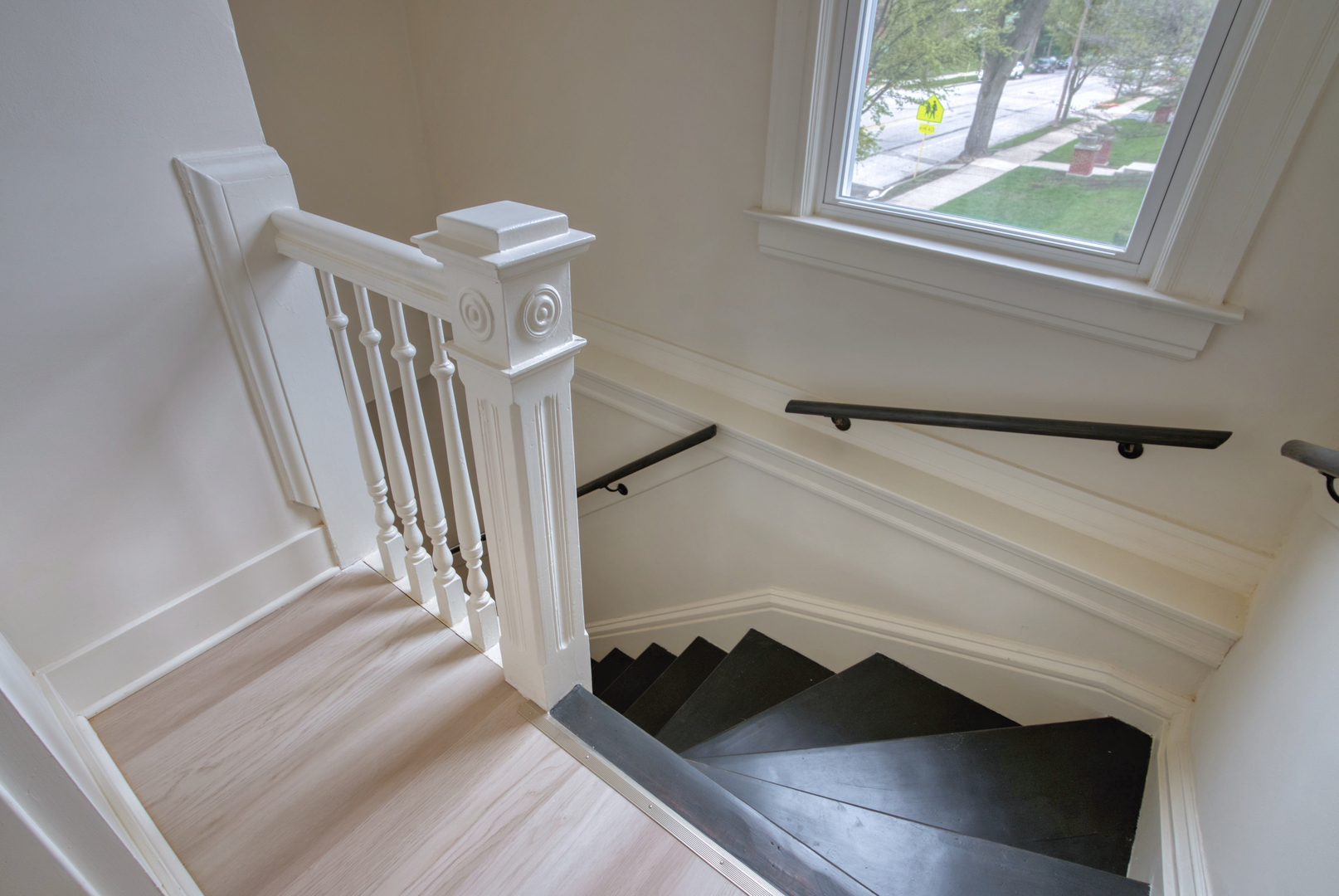 418 Ridge Road, Unit 2 Wilmette, IL 60091 - Photo 3 of 17 a view of entryway and hall with wooden floor