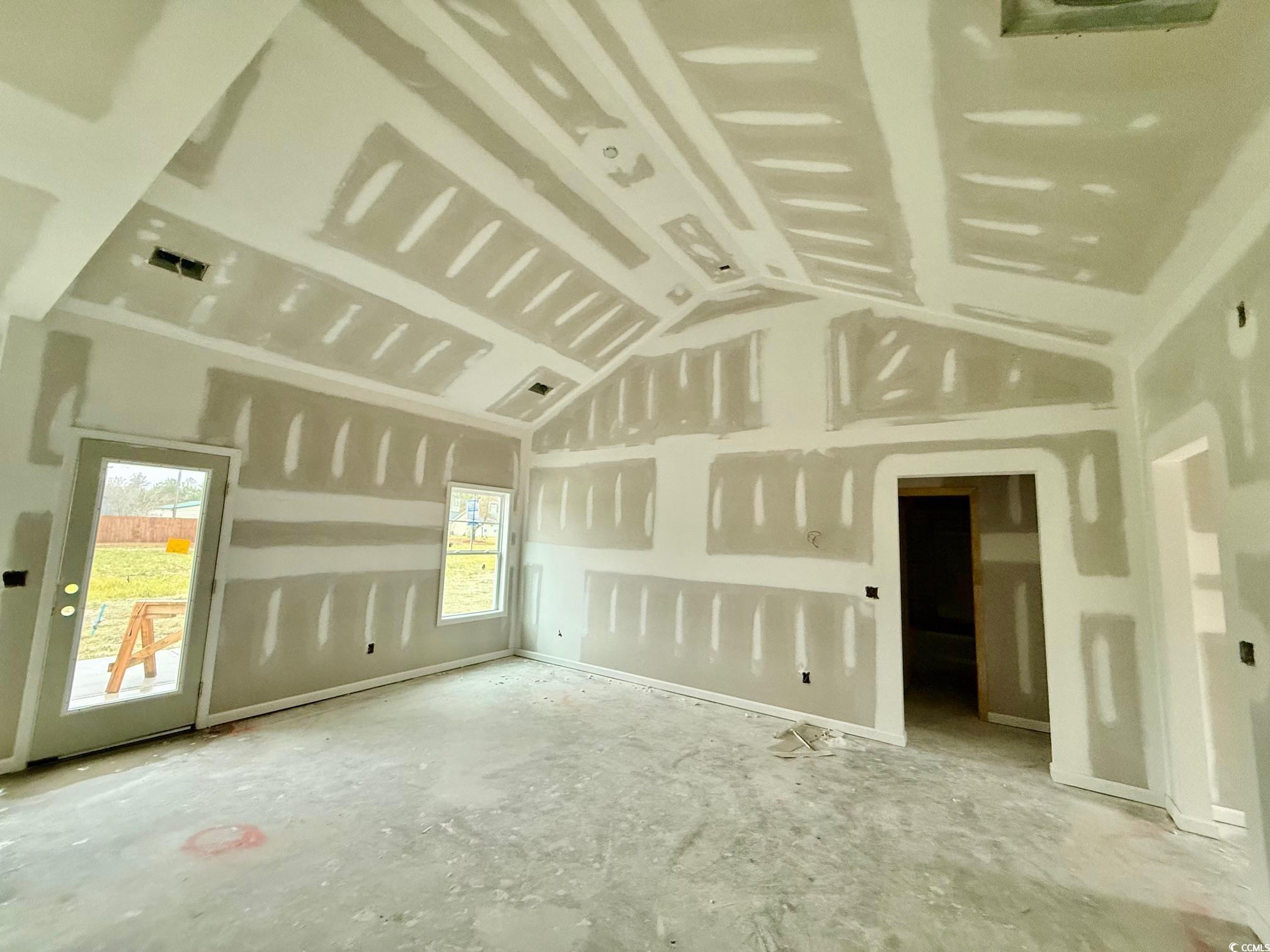 282 Lexyryan Court Latta, SC 29565 - Photo 4 of 8 Empty room with vaulted ceiling