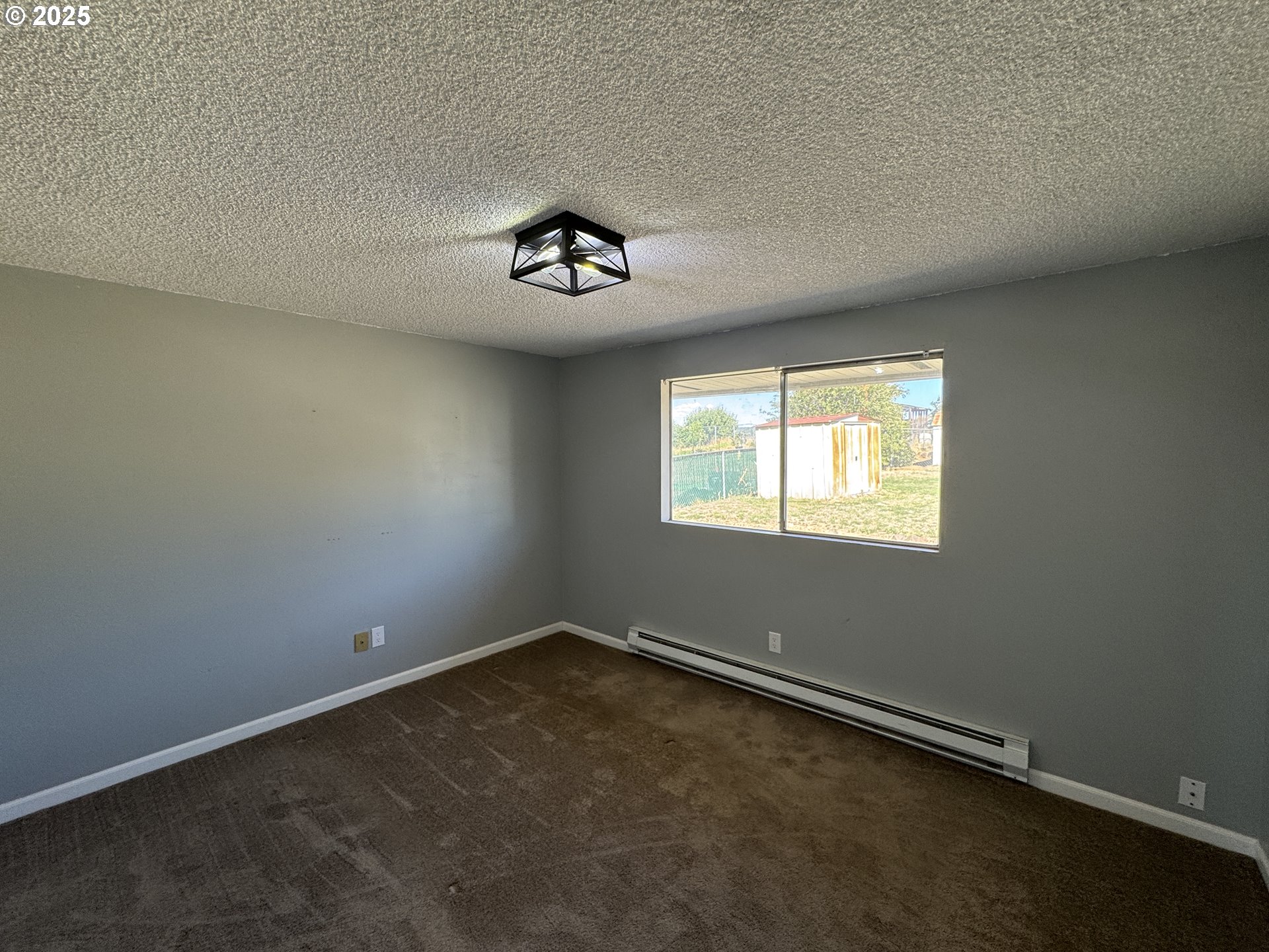 328 Allison Way Goldendale, WA 98620 - Photo 18 of 31 an empty room with a window