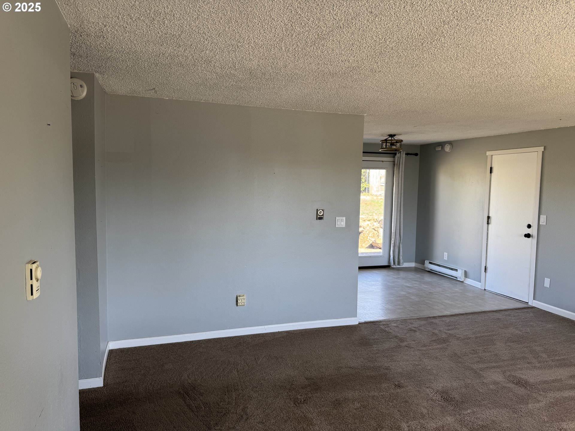 328 Allison Way Goldendale, WA 98620 - Photo 4 of 31 an empty room with windows and closet