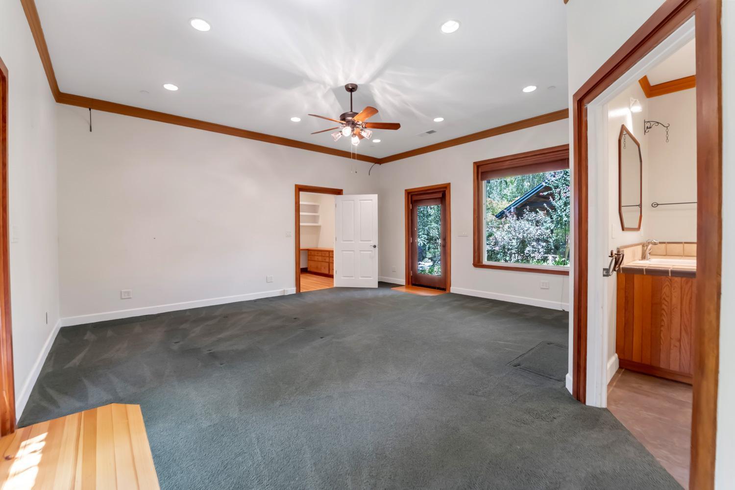 683 Stewart Road Yuba City, CA 95991 - Photo 4 of 55 a view of an empty room with a window