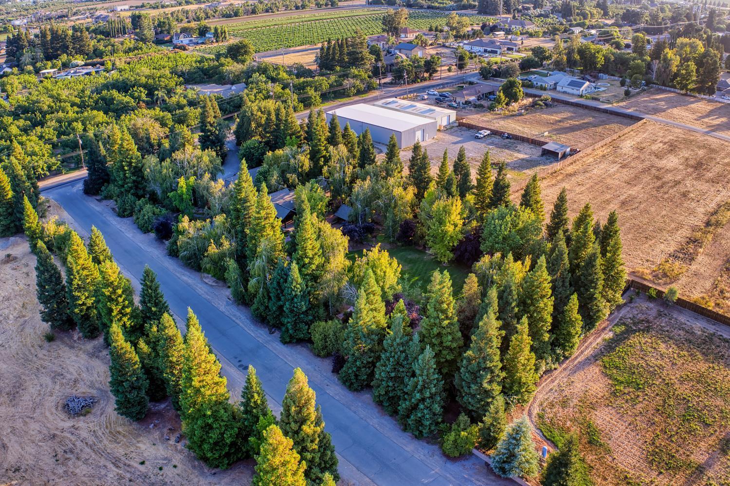 683 Stewart Road Yuba City, CA 95991 - Photo 49 of 55 an aerial view of residential houses with outdoor space