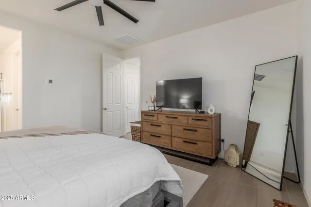 a view of a kitchen with a sink and cabinets