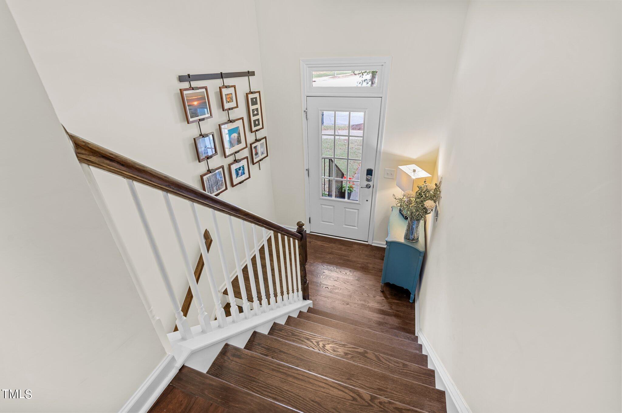 5657 Wade Park Boulevard Raleigh, NC 27607 - Photo 3 of 24 a view of entryway with wooden floor