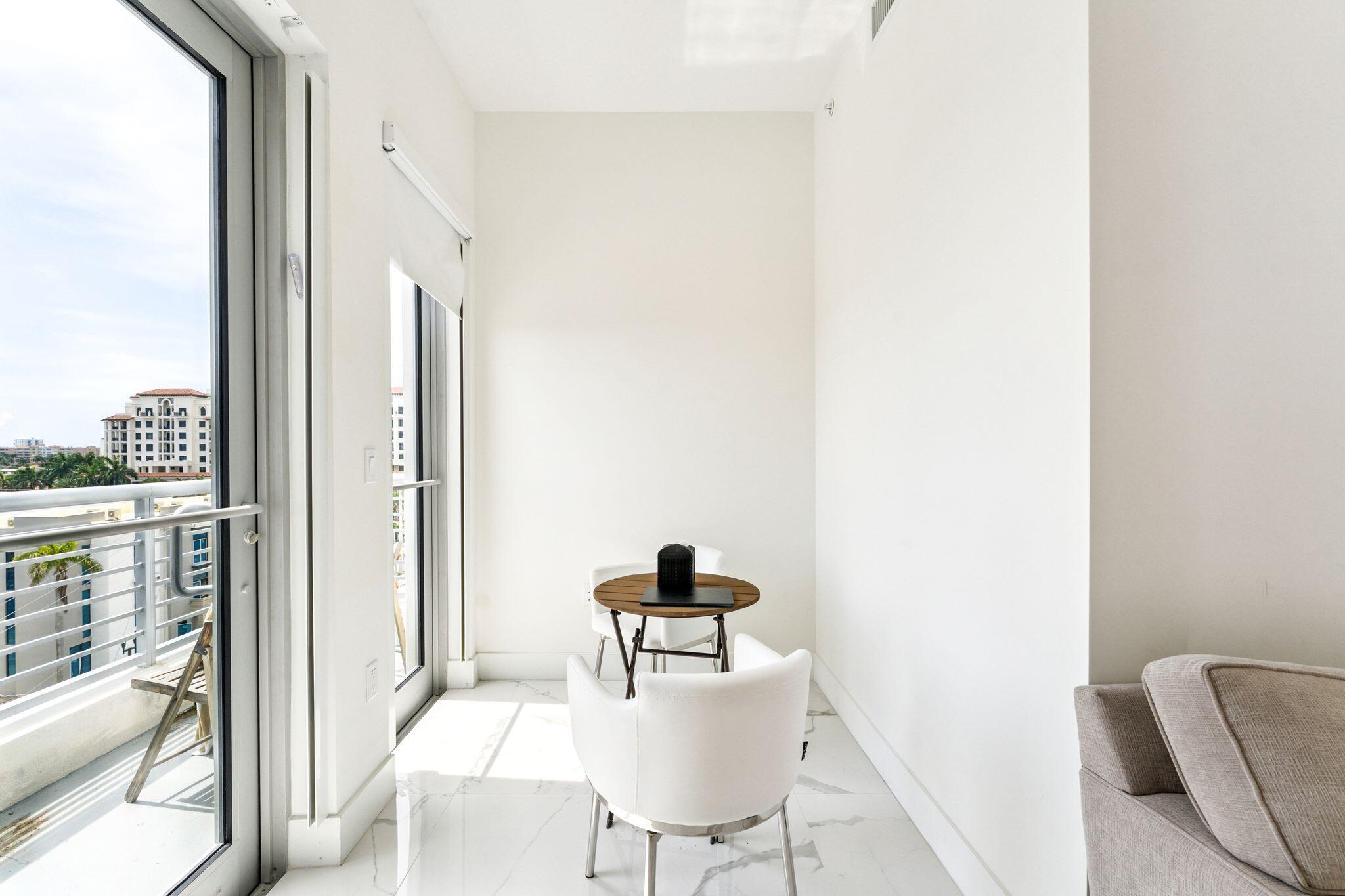 155 East Boca Raton Road, Unit 603 Boca Raton, FL 33432 - Photo 20 of 55 a dining room with furniture and wooden floor