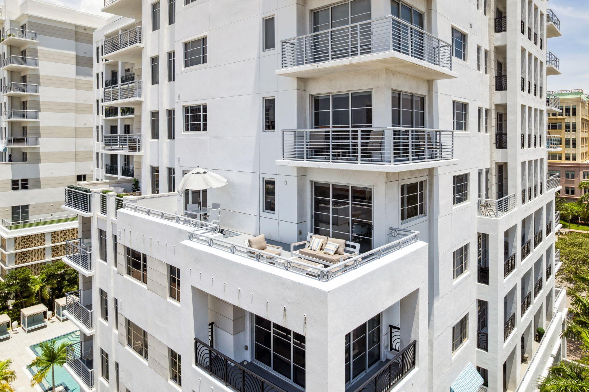155 East Boca Raton Road, Unit 603 Boca Raton, FL 33432 - Photo 2 of 55 a white building with a lot of windows