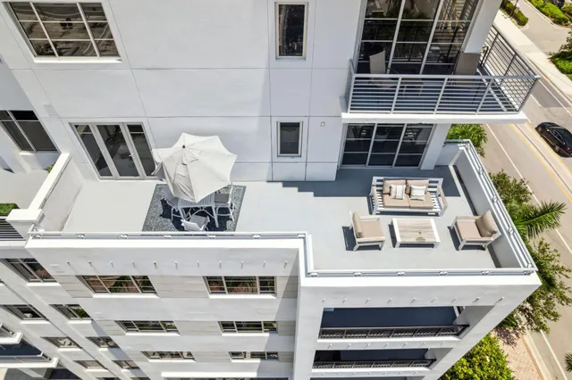 a view of a terrace with furniture