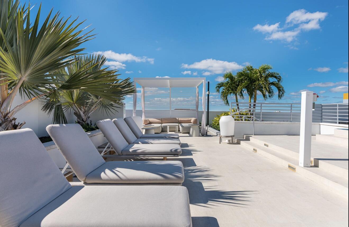 155 East Boca Raton Road, Unit 603 Boca Raton, FL 33432 - Photo 39 of 55 a view of a chairs and table in patio