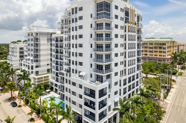 a kitchen with a sink cabinets and window