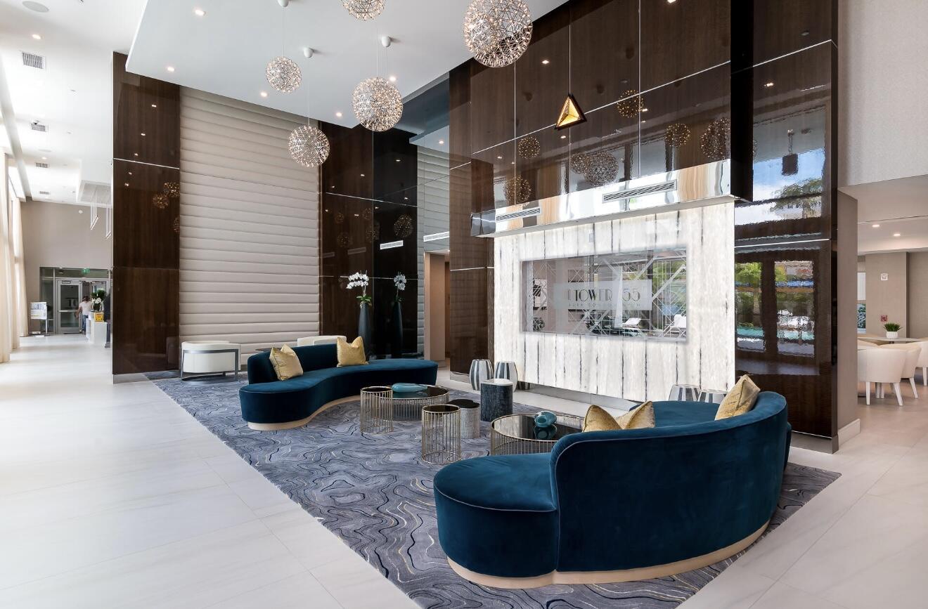 155 East Boca Raton Road, Unit 603 Boca Raton, FL 33432 - Photo 43 of 55 a living room with couch and a potted plant