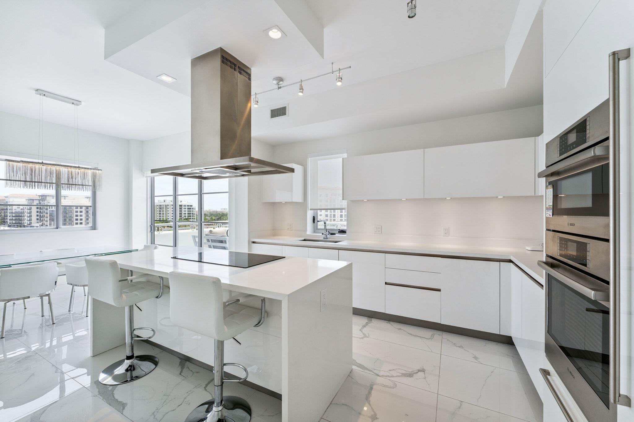 155 East Boca Raton Road, Unit 603 Boca Raton, FL 33432 - Photo 5 of 55 a kitchen with a sink cabinets and window