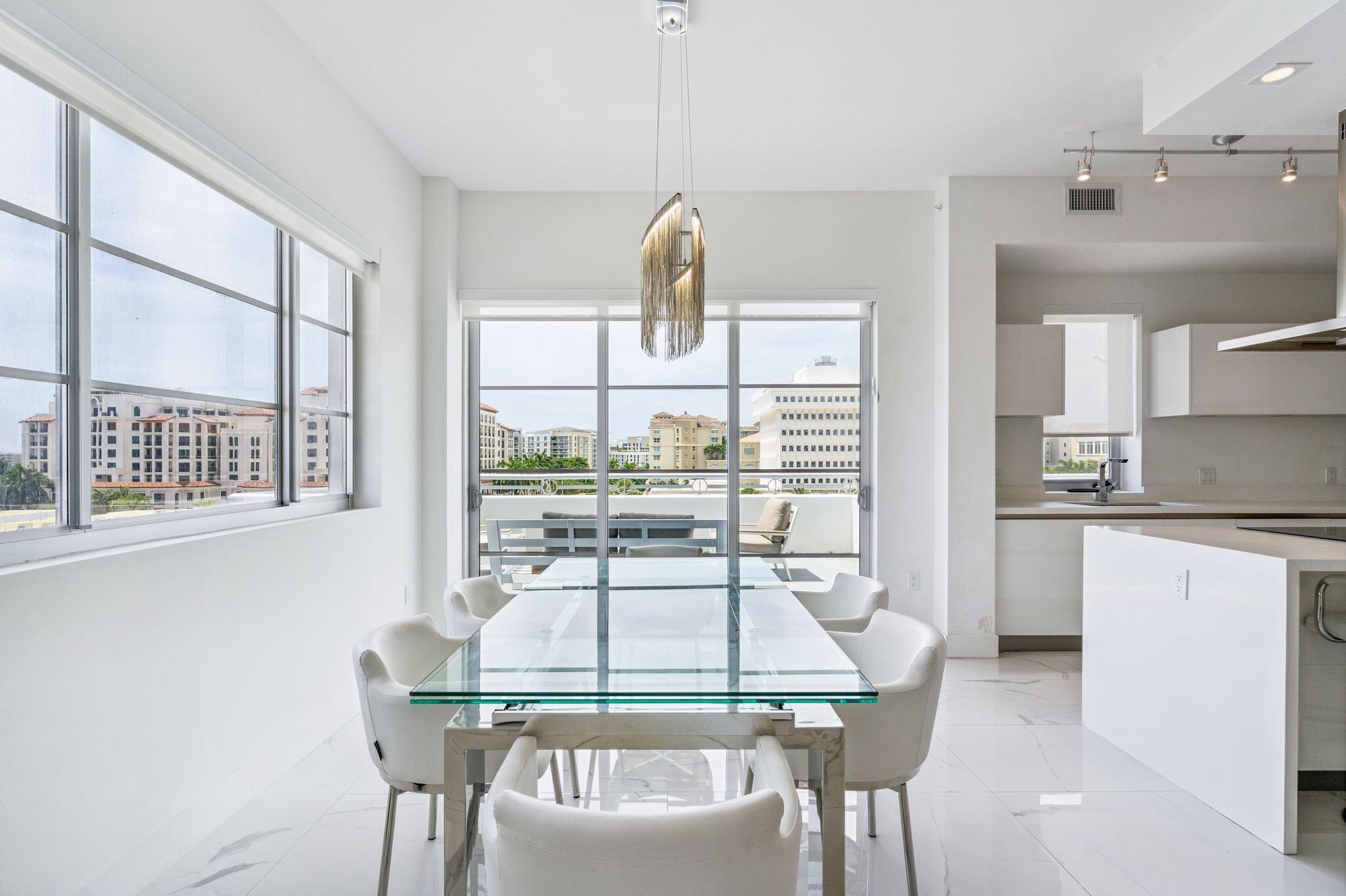 155 East Boca Raton Road, Unit 603 Boca Raton, FL 33432 - Photo 6 of 55 a view of a dining room with furniture window and outside view