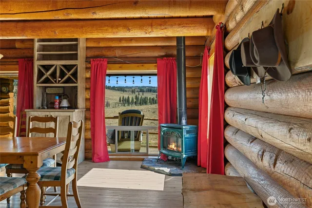 a room with chairs and window