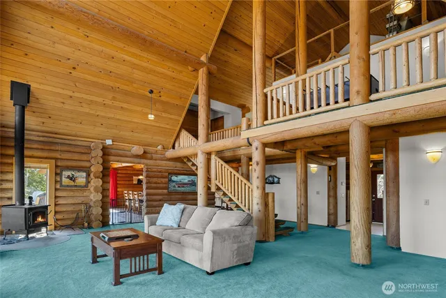 a kitchen with a stove a table and chairs