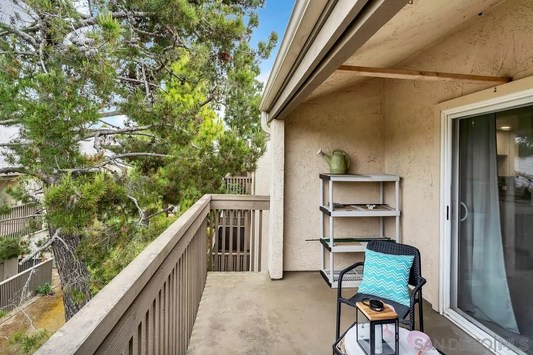 8524 Via Mallorca, Unit C La Jolla, CA 92037 - Photo 26 of 36 a balcony with table and chairs