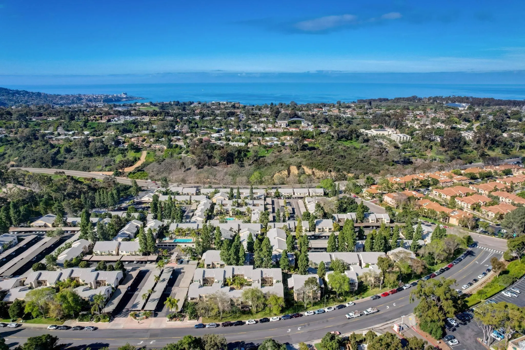 8524 Via Mallorca, Unit C La Jolla, CA 92037 - Photo 31 of 36 an aerial view of residential houses with outdoor space