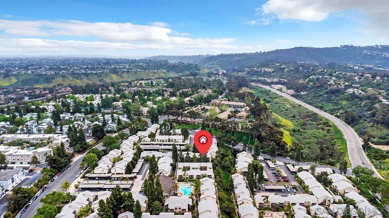 8524 Via Mallorca, Unit C La Jolla, CA 92037 - Photo 36 of 36 an aerial view of city and lake