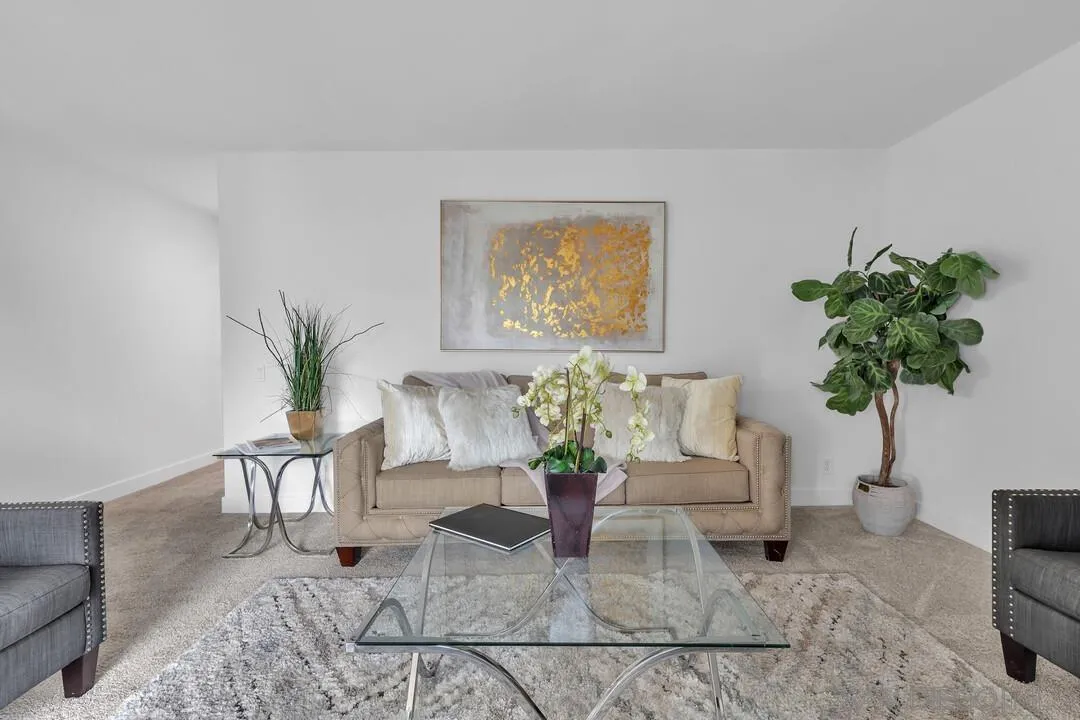 8524 Via Mallorca, Unit C La Jolla, CA 92037 - Photo 4 of 36 a living room with furniture flowerpot and a potted plant
