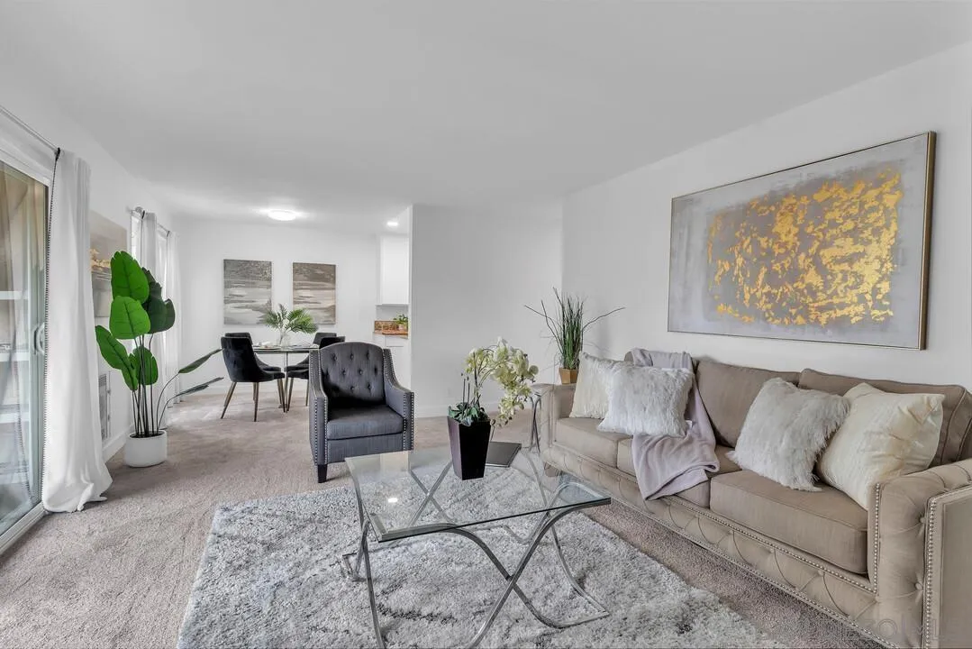 8524 Via Mallorca, Unit C La Jolla, CA 92037 - Photo 5 of 36 a living room with furniture and wooden floor